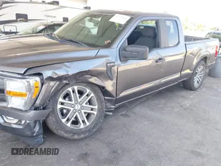 2021 Ford F-150 XL with VIN 1FTEX1CP5MFA52842, listed as a IAAI auction lot 42520858 with 107,873 mi miles and . Bid and sale history available at DreamBid. Image 6.