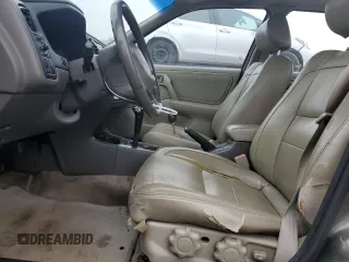 2000 Infiniti G20 Luxury z VIN JNKCP11A1YT304887, wystawiony jako Copart lot #74562724 z przebiegiem 202 140 mil mil oraz Czysty tytuł • Clean title. Historia ofert i sprzedaży dostępna na DreamBid. Obrazek 7.