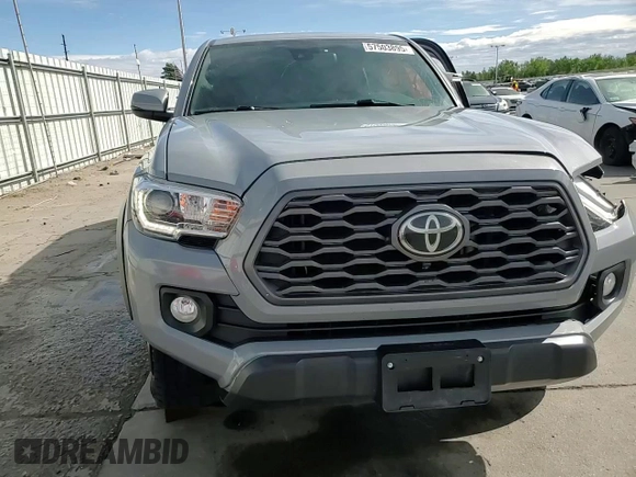 2020 Toyota Tacoma SR5 with VIN 3TMDZ5BN6LM097302, listed as a Copart auction lot 57503895 with 77,212 mi miles and Salvage title. Bid and sale history available at DreamBid. Image 13.