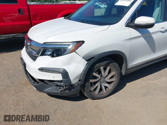 2020 Honda Pilot EX-L z VIN 5FNYF6H56LB010316, wystawiony jako IAAI lot #42433400 z przebiegiem 48 764 mil mil oraz . Historia ofert i sprzedaży dostępna na DreamBid. Obrazek 6.