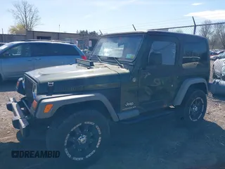 2006 Jeep Wrangler SE with VIN 1J4FA29116P763914, listed as a IAAI auction lot 42140140 with 107,161 mi miles. Bid and sale history available at carsss.com. Image 18.