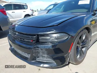 2016 Dodge Charger SXT with VIN 2C3CDXHG6GH146764, listed as a IAAI auction lot 42020618 with 154,693 mi miles and . Bid and sale history available at carsss.com. Image 20.