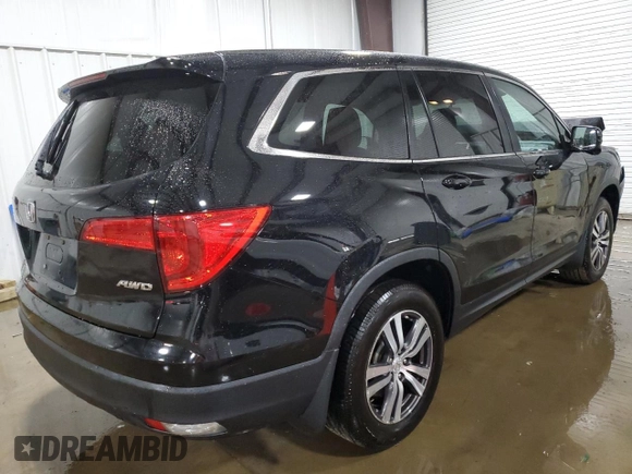 2017 Honda Pilot EX-L with VIN 5FNYF6H55HB096659, listed as a Copart auction lot 60426095 with 144,047 mi miles and Salvage title. Bid and sale history available at DreamBid. Image 3.