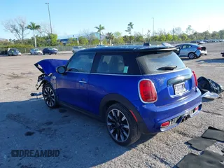 2020 MINI Hardtop Cooper S z VIN WMWXR5C09L2M32640, wystawiony jako IAAI lot #41463311 z przebiegiem 62 050 mil mil oraz . Historia ofert i sprzedaży dostępna na DreamBid. Obrazek 3.