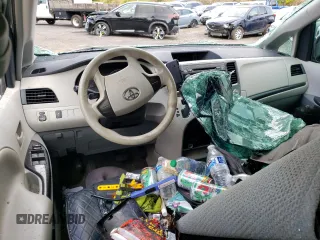 2014 Toyota Sienna L with VIN 5TDZK3DC8ES520037, listed as a Copart auction lot 54092715 with Not provided miles and Salvage title. Bid and sale history available at DreamBid. Image 8.