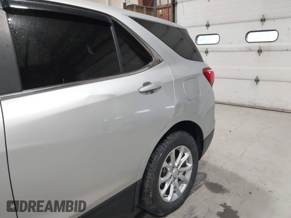 2021 Chevrolet Equinox LT z VIN 3GNAXUEV9MS140887, wystawiony jako IAAI lot #42246019 z przebiegiem 65 108 mil mil oraz . Historia ofert i sprzedaży dostępna na DreamBid. Obrazek 19.