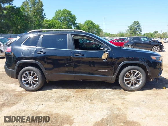 2019 Jeep Cherokee Latitude Plus z VIN 1C4PJLLBXKD123116, wystawiony jako IAAI lot #41981044 z przebiegiem 173 232 mil mil oraz . Historia ofert i sprzedaży dostępna na DreamBid. Obrazek 14.