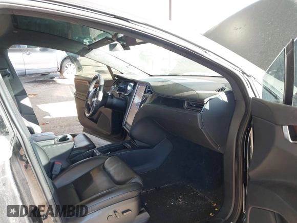 2020 Tesla Model X Long Range with VIN 5YJXCDE24LF272242, listed as a IAAI auction lot 41275226 with 103,731 mi miles. Bid and sale history available at carsss.com. Image 5.