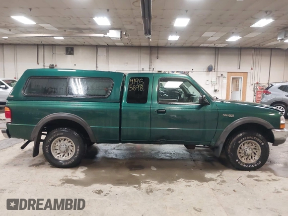 1999 Ford Ranger XL with VIN 1FTZR15V3XTA98120, listed as a IAAI auction lot 41955698 with 197,733 mi miles. Bid and sale history available at carsss.com. Image 14.