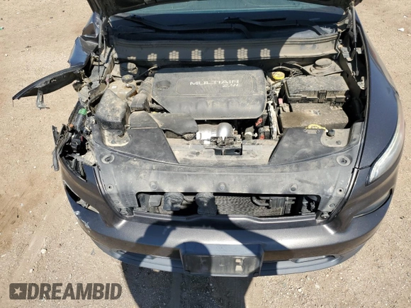 2015 Jeep Cherokee Latitude z VIN 1C4PJMCB2FW734385, wystawiony jako Copart lot #57333805 z przebiegiem 121 249 mil mil oraz Szkoda całkowita • Salvage title. Historia ofert i sprzedaży dostępna na DreamBid. Obrazek 12.