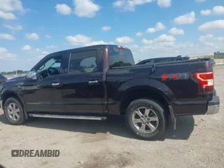 2018 Ford F-150 XL with VIN 1FTEW1EP8JFC77493, listed as a IAAI auction lot 42073382 with Not Provided miles and . Bid and sale history available at carsss.com. Image 13.