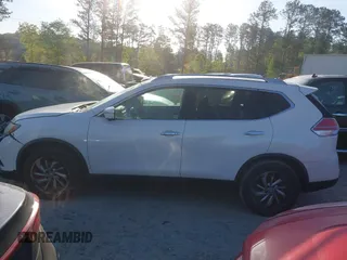 2014 Nissan Rogue SV with VIN 5N1AT2MT7EC751433, listed as a IAAI auction lot 42053564 with 207,476 mi miles and . Bid and sale history available at DreamBid. Image 14.