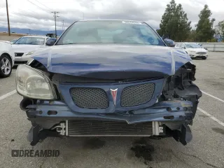2009 Pontiac G5 with VIN 1G2AS18H997204531, listed as a Copart auction lot 48634655 with 73,936 mi miles and Salvage Title. Bid and sale history available at DreamBid. Image 5.