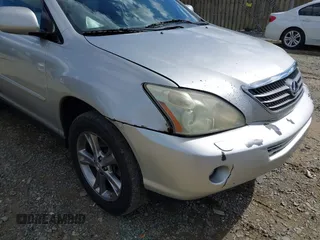 2007 Lexus RX 400h with VIN JTJGW31U672001021, listed as a IAAI auction lot 42209431 with 245,653 mi miles and . Bid and sale history available at DreamBid. Image 6.