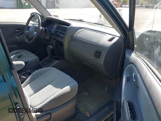 2002 Suzuki XL-7 Standard with VIN JS3TX92V124124409, listed as a IAAI auction lot 42166017 with 194,418 mi miles. Bid and sale history available at carsss.com. Image 5.