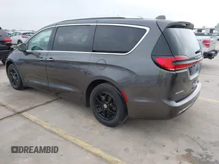 2021 Chrysler Pacifica Touring L z VIN 2C4RC1BG3MR574439, wystawiony jako IAAI lot #42190695 z przebiegiem 104 188 mil mil oraz . Historia ofert i sprzedaży dostępna na DreamBid. Obrazek 3.