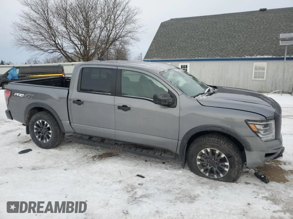 2024 Nissan Titan Pro-4X with VIN 1N6AA1ED1RN115335, listed as a Copart auction lot 42597585 with 5,381 mi miles and Salvage title. Bid and sale history available at DreamBid. Image 4.