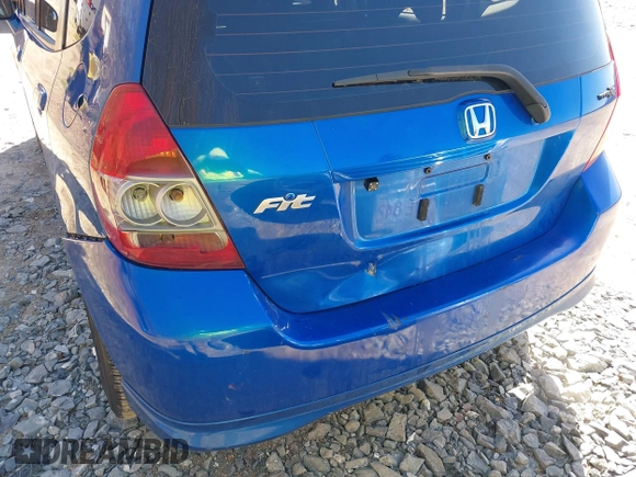 2007 Honda Fit Sport z VIN JHMGD38647S049292, wystawiony jako IAAI lot #41971049 z przebiegiem 206 846 mil mil oraz . Historia ofert i sprzedaży dostępna na DreamBid. Obrazek 14.