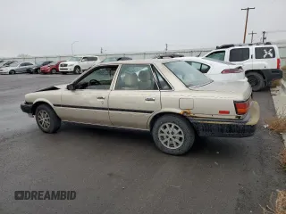 1991 Toyota Camry z VIN 4T1SV24E0MU379572, wystawiony jako Copart lot #78090294 z przebiegiem 242 052 mil mil oraz Szkoda całkowita • Salvage title. Historia ofert i sprzedaży dostępna na DreamBid. Obrazek 2.