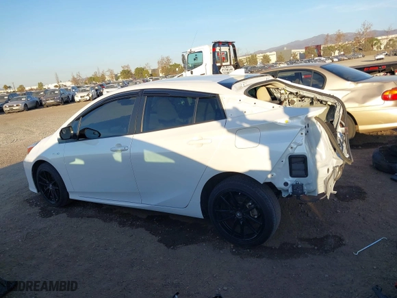 2021 Toyota Prius L Eco with VIN JTDKAMFU8M3132998, listed as a IAAI auction lot 41227212 with 64,681 mi miles. Bid and sale history available at carsss.com. Image 15.