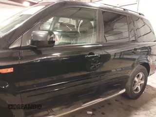 2007 Honda Pilot EX-L with VIN 5FNYF18677B017230, listed as a IAAI auction lot 41727853 with 257,527 mi miles and . Bid and sale history available at DreamBid. Image 15.