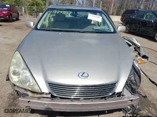 2005 Lexus ES 330 with VIN JTHBA30G355117200, listed as a IAAI auction lot 41889802 with 144,559 mi miles. Bid and sale history available at carsss.com. Image 13.