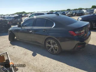 2021 BMW 3 Series 330i xDrive with VIN WBA5R7C02MFK43728, listed as a Copart auction lot 49215604 with 25,903 mi miles. Bid and sale history available at carsss.com. Image 2.