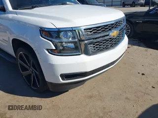2015 Chevrolet Tahoe LS with VIN 1GNSCAKCXFR748554, listed as a IAAI auction lot 41765865 with 160,282 mi miles and . Bid and sale history available at DreamBid. Image 6.