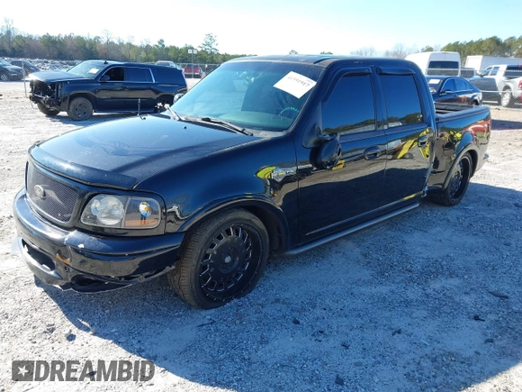 2002 Ford F-150 Harley Davidson with VIN 1FTRW07312KC24102, listed as a IAAI auction lot 41591917 with 1 mi miles. Bid and sale history available at carsss.com. Image 18.