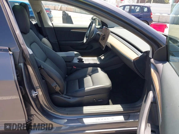 2023 Tesla Model 3 z VIN 5YJ3E1EA6PF694419, wystawiony jako IAAI lot #42268637 z przebiegiem 17 419 mil mil oraz . Historia ofert i sprzedaży dostępna na DreamBid. Obrazek 5.