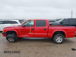 2004 Dodge Dakota Sport with VIN 1D7HL38KX4S657177, listed as a IAAI auction lot 41534575 with 38,802 mi miles. Bid and sale history available at carsss.com. Image 14.