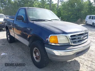 2004 Ford F-150 XL with VIN 2FTRF18294CA23695, listed as a IAAI auction lot 42233802 with Not provided miles and . Bid and sale history available at DreamBid. Image 1.