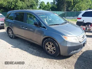 2012 Honda Odyssey EX-L with VIN 5FNRL5H62CB061988, listed as a IAAI auction lot 42826181 with 181,844 mi miles and . Bid and sale history available at DreamBid. Image 1.