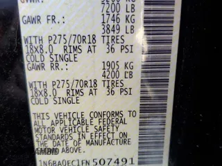 2015 Nissan Titan Pro-4X with VIN 1N6BA0EC1FN507491, listed as a Copart auction lot 51240915 with 165,510 mi miles and Salvage title. Bid and sale history available at DreamBid. Image 15.