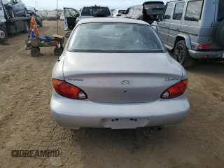 1999 Hyundai Elantra z VIN KMHJF25F8XU852123, wystawiony jako Copart lot #72284584 z przebiegiem 12 750 mil mil oraz Czysty tytuł • Clean title. Historia ofert i sprzedaży dostępna na DreamBid. Obrazek 6.