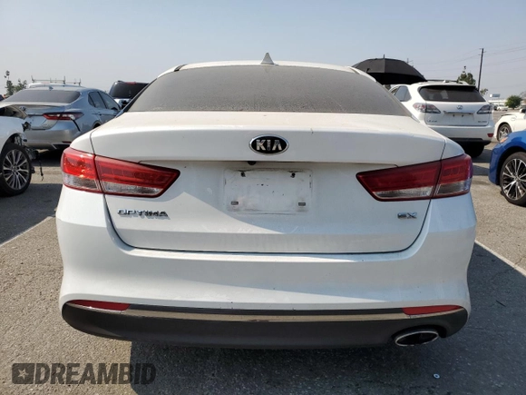 2016 Kia Optima EX with VIN 5XXGU4L32GG086761, listed as a Copart auction lot 64317125 with 145,967 mi miles and Salvage title. Bid and sale history available at DreamBid. Image 6.