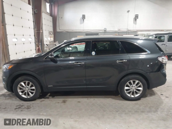 2016 Kia Sorento LX with VIN 5XYPGDA39GG170291, listed as a IAAI auction lot 42045883 with 136,848 mi miles. Bid and sale history available at carsss.com. Image 14.