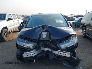 2025 Honda Odyssey Touring with VIN 5FNRL6H81SB011122, listed as a IAAI auction lot 41402170 with 2,968 mi miles and . Bid and sale history available at DreamBid. Image 6.
