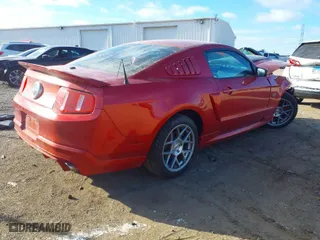 2010 Ford Mustang GT with VIN 1ZVBP8CH0A5134495, listed as a IAAI auction lot 41233584 with 61,267 mi miles. Bid and sale history available at carsss.com. Image 4.