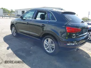 2017 Audi Q3 Premium Plus z VIN WA1JCCFS5HR001068, wystawiony jako IAAI lot #42038452 z przebiegiem 136 661 mil mil oraz . Historia ofert i sprzedaży dostępna na DreamBid. Obrazek 3.