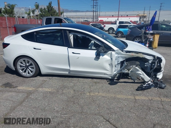 2022 Tesla Model 3 Long Range with VIN 5YJ3E1EB7NF298456, listed as a IAAI auction lot 41859304 with Not Provided miles and . Bid and sale history available at DreamBid. Image 13.