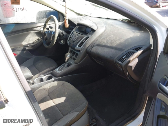 2012 Ford Focus SE with VIN 1FAHP3K23CL251716, listed as a IAAI auction lot 42036099 with 119,600 mi miles. Bid and sale history available at carsss.com. Image 5.