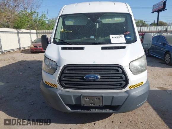2017 Ford Transit Cargo with VIN 1FTYE1CM4HKB25432, listed as a IAAI auction lot 41830840 with 184,829 mi miles and . Bid and sale history available at carsss.com. Image 12.