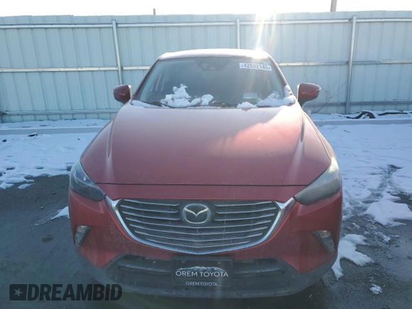 2016 Mazda CX-3 Grand Touring with VIN JM1DKBD78G0113185, listed as a Copart auction lot 42802145 with 158,068 mi miles and Salvage Title. Bid and sale history available at DreamBid. Image 5.