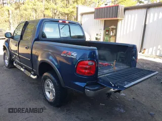 2002 Ford F-150 XLT with VIN 1FTRW086X2KE17566, listed as a IAAI auction lot 41721236 with 98,524 mi miles. Bid and sale history available at carsss.com. Image 3.