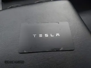2019 Tesla Model 3 Mid Range with VIN 5YJ3E1EA8KF472540, listed as a IAAI auction lot 41661312 with 75,575 mi miles and . Bid and sale history available at DreamBid. Image 11.