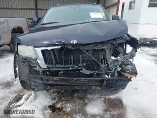 2011 Jeep Grand Cherokee Laredo with VIN 1J4RR4GG0BC610046, listed as a IAAI auction lot 41730587 with 177,032 mi miles. Bid and sale history available at carsss.com. Image 6.