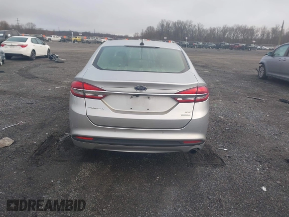 2018 Ford Fusion SE z VIN 3FA6P0HD2JR207865, wystawiony jako IAAI lot #41835895 z przebiegiem 91 069 mil mil oraz . Historia ofert i sprzedaży dostępna na DreamBid. Obrazek 16.