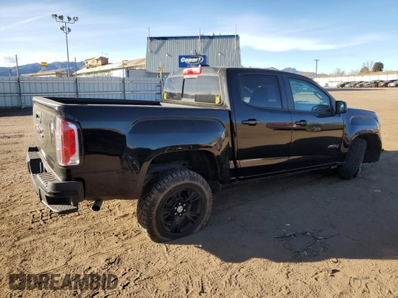 2021 GMC Canyon 4WD AT4 w/Cloth with VIN 1GTG6FEN9M1254293, listed as a Copart auction lot 87163874 with 33,645 mi miles and Salvage Title. Bid and sale history available at carsss.com. Image 3.