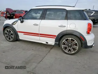 2014 MINI Countryman S with VIN WMWZC3C53EWT01161, listed as a Copart auction lot 50586965 with 151,813 mi miles and Salvage Title. Bid and sale history available at DreamBid. Image 2.